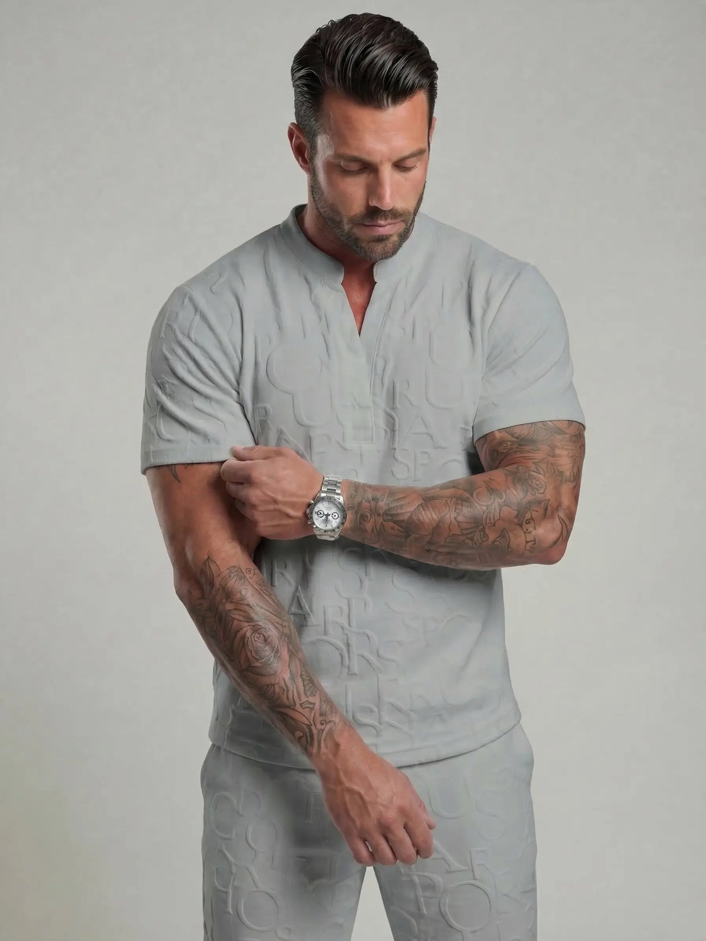Grey textured notched-neck short sleeve top and pants set